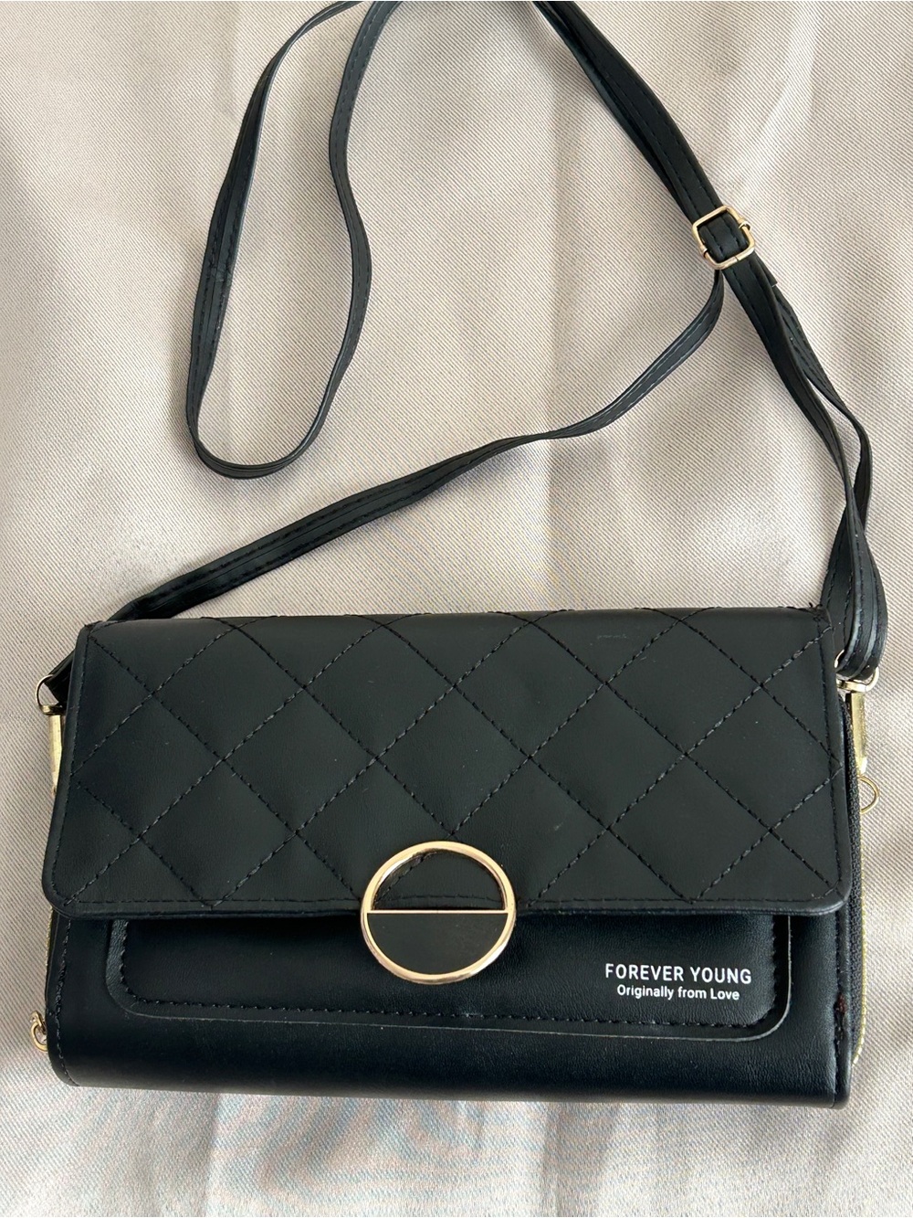 Forever Young Black Quilted Crossbody with Gold Ring Detail